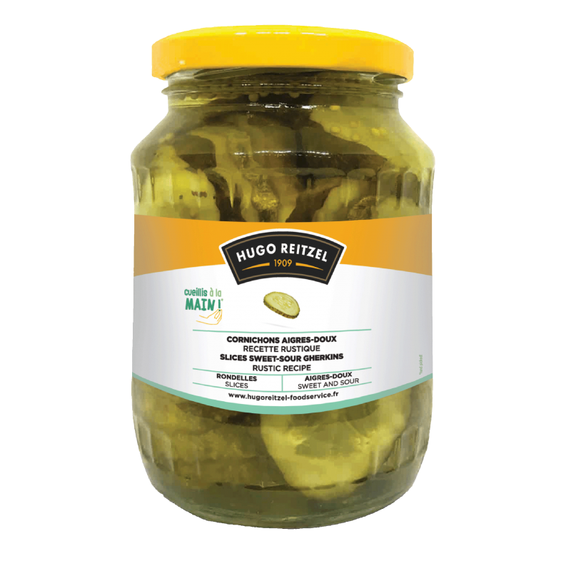 Gros cornichons aigres-doux en rondelles, recette rustique, en bocal Gros cornichons aigres-doux en rondelles, recette rustique, en bocal